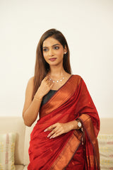 Opulent Maroon Copper Zari Saree